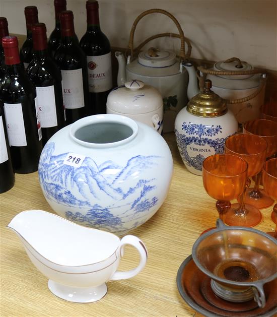A group of ceramics including two teapots, a Worcester gravy boat, tobacco jars, etc.